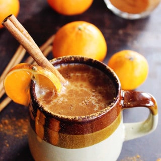 Almond milk chai with whiskey and orange
