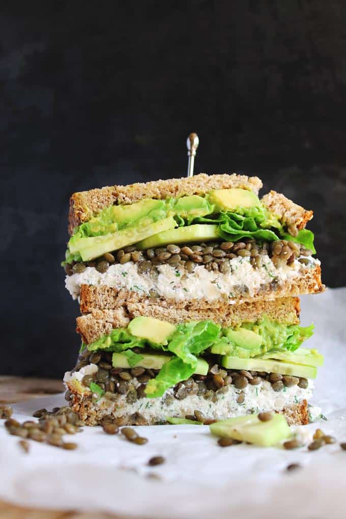 Stacked sandwich with lentils, ricotta, and veggies