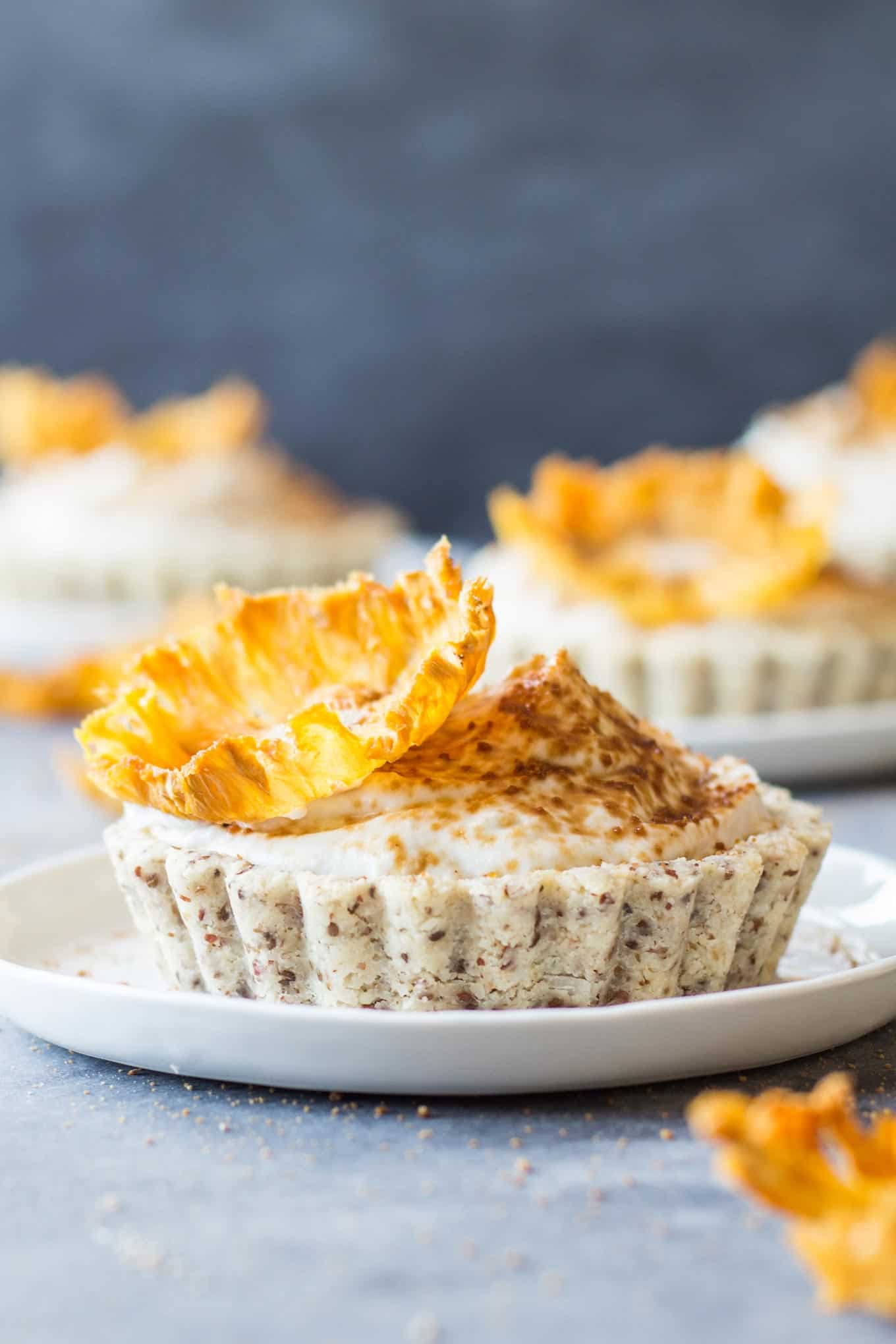 Pineapple coconut tartlets recipe! Green Healthy Cooking's beautiful and elegant recipe for dairy free pineapple coconut tartlets topped with edible pineapple "flowers." An amazing dessert!