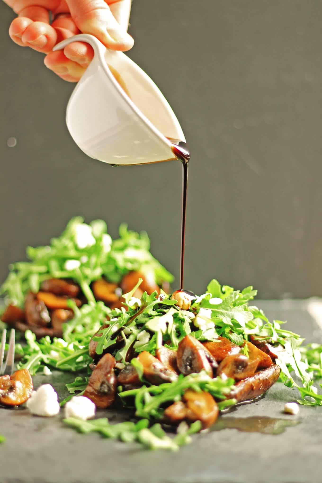 Stacked ale mushrooms with arugula and goat cheese recipe! This 2-mushroom vegetarian dish is sure to please that beer lover in your life. SO GOOD! // Rhubarbarians