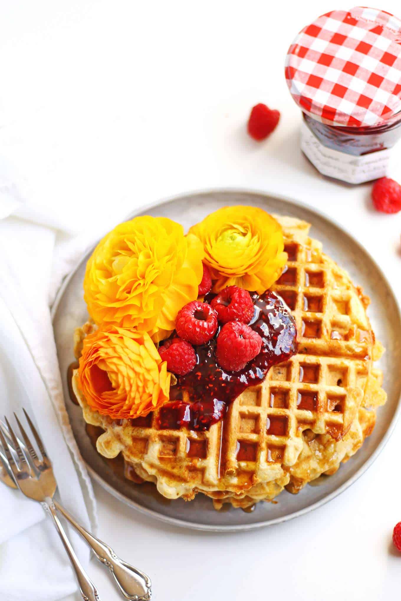 Cheesy green chile cornbread waffles with raspberry preserves recipe! An amazing, savory waffle with cheddar, walnuts, and green chiles. YUM! // Rhubarbarians // Mother’s day breakfast / Mother’s day brunch / brunch recipe / breakfast recipe