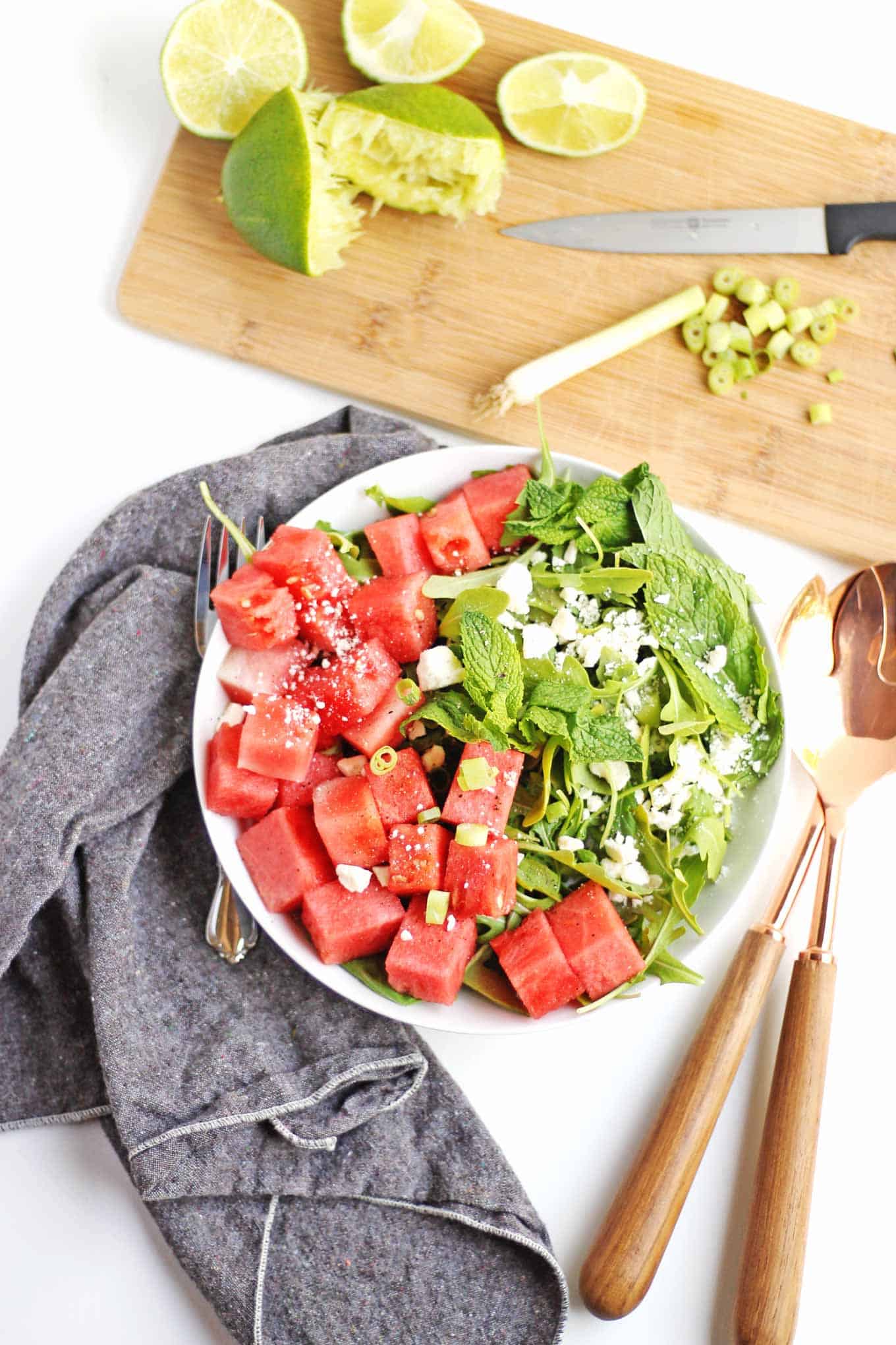 watermelon and arugula feta salad with squeezed limes