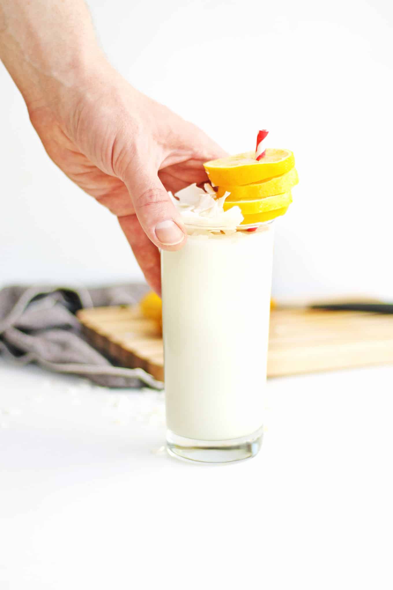Healthy lemon coconut smoothie recipe! A tart, yet sweet way to load up on probiotics and nutrients. // Rhubarbarians // yogurt smoothie / tropical smoothie