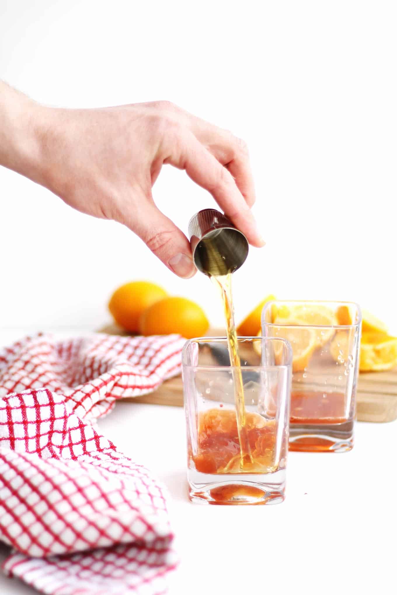 Simple, meyer lemon old fashioned recipe! A bright and refreshing spin on the classic old fashioned cocktail with rye, bourbon, or whiskey. // Rhubarbarians