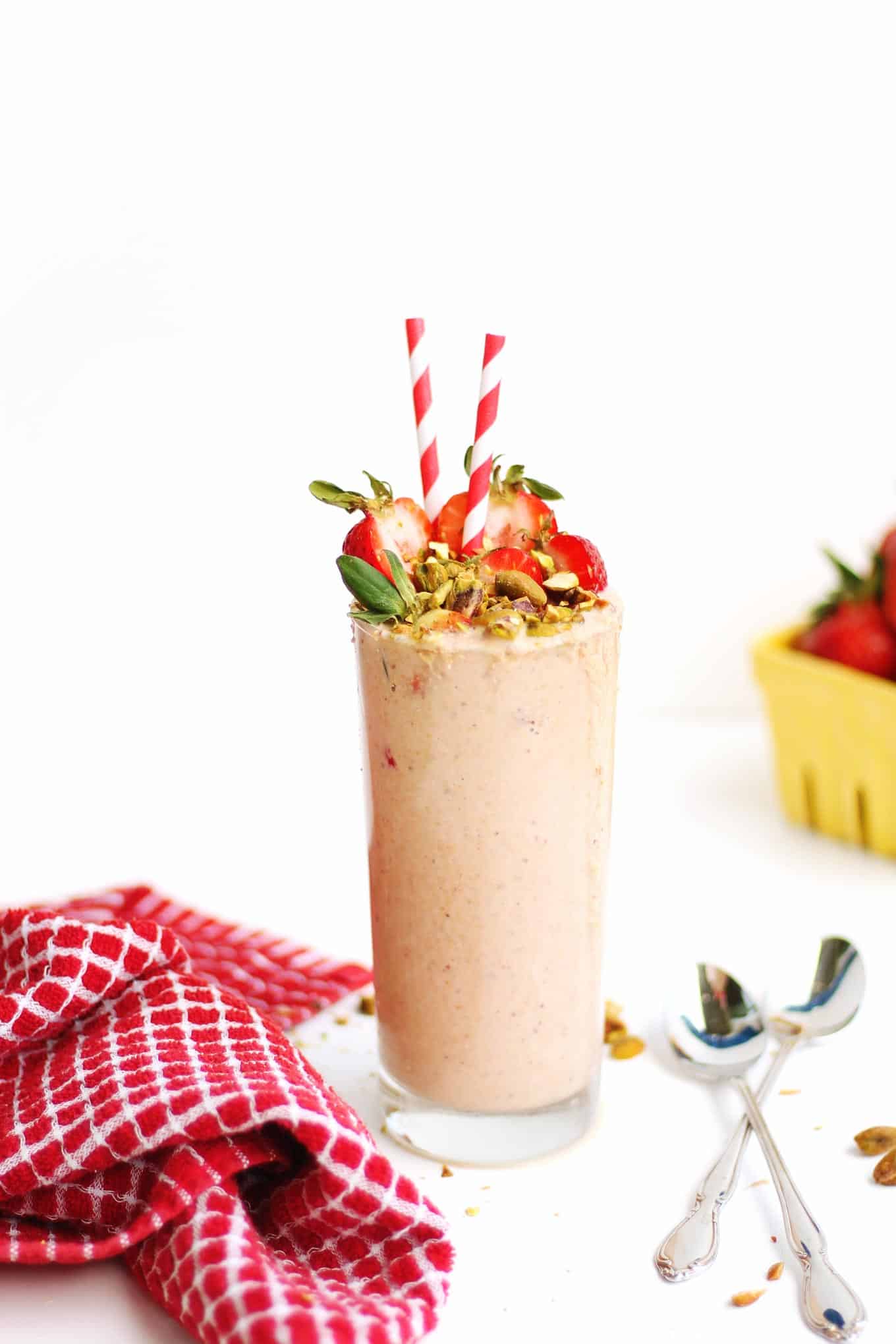 Creamy vegan strawberry smoothie with pistachios recipe! This dairy free pistachio strawberry smoothie is extra thick and nutty from real nuts! // Rhubarbarians