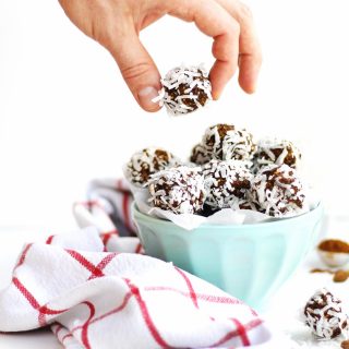 Plum and pistachio coconut bliss balls recipe! These protein packed coconut bites are the perfect quick snack or healthy treat. Vegan and gluten free. // Rhubarbarians