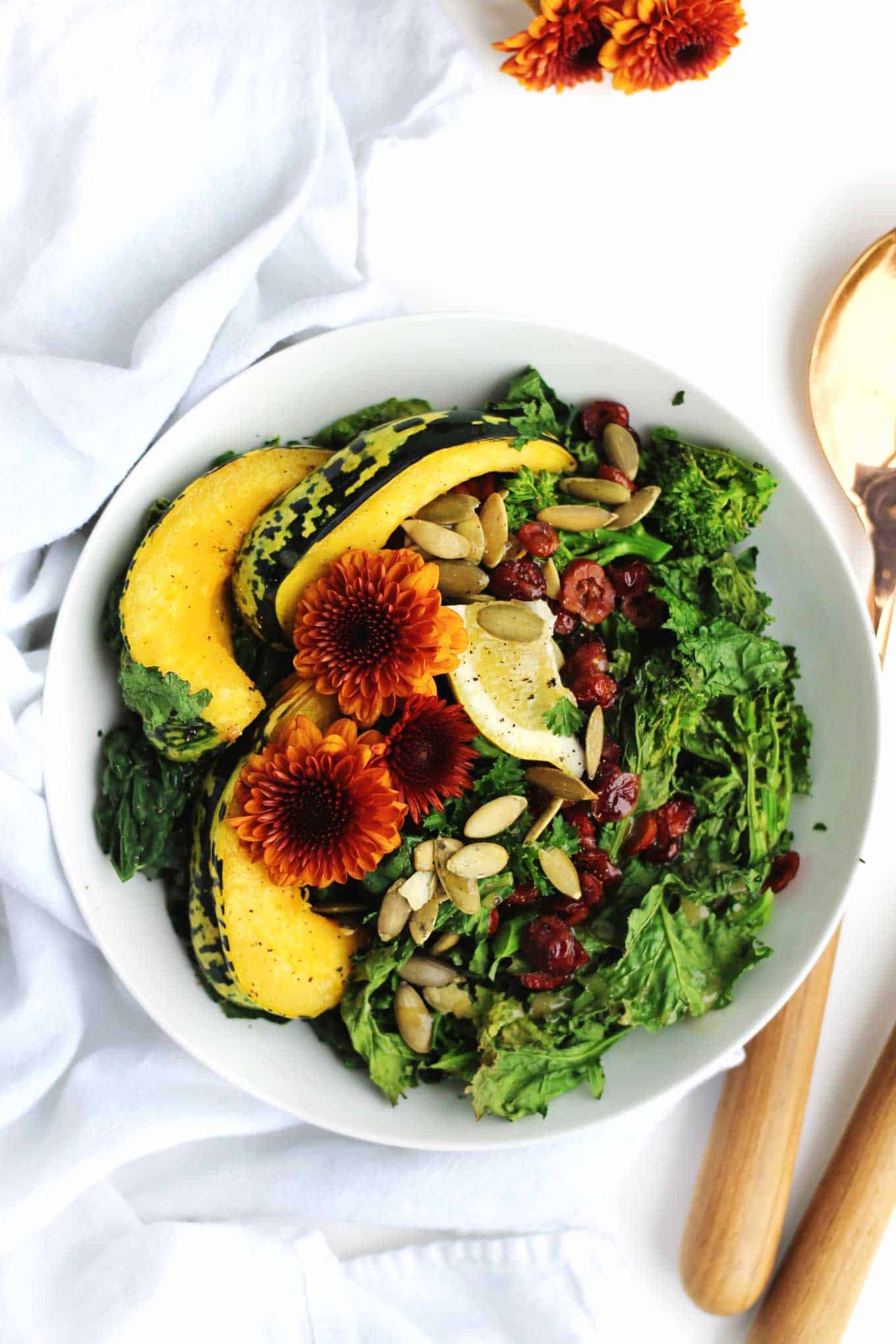 30-minute roasted squash salad with broccoli rabe and kale recipe! A warm, vegan salad perfect for a healthy weeknight dinner or meatless monday. // Rhubarbarians // vegetarian salad / dairy free dinner / gluten free meal / #roastedsquash #meatlessmonday #vegandinner #healthysalad #rhubarbarians #glutenfree