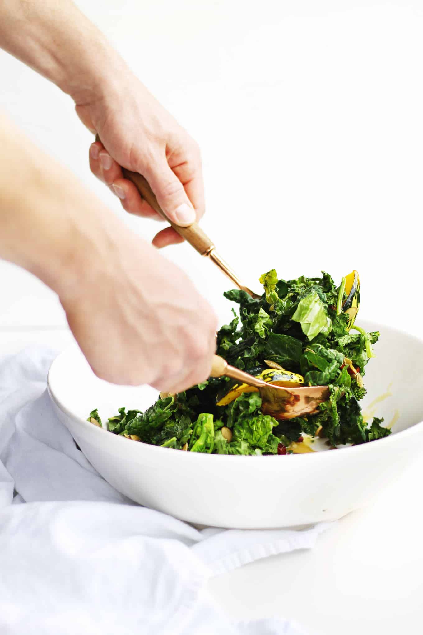 30-minute roasted squash salad with broccoli rabe and kale recipe! A warm, vegan salad perfect for a healthy weeknight dinner or meatless monday. // Rhubarbarians // vegetarian salad / dairy free dinner / gluten free meal / #roastedsquash #meatlessmonday #vegandinner #healthysalad #rhubarbarians #glutenfree