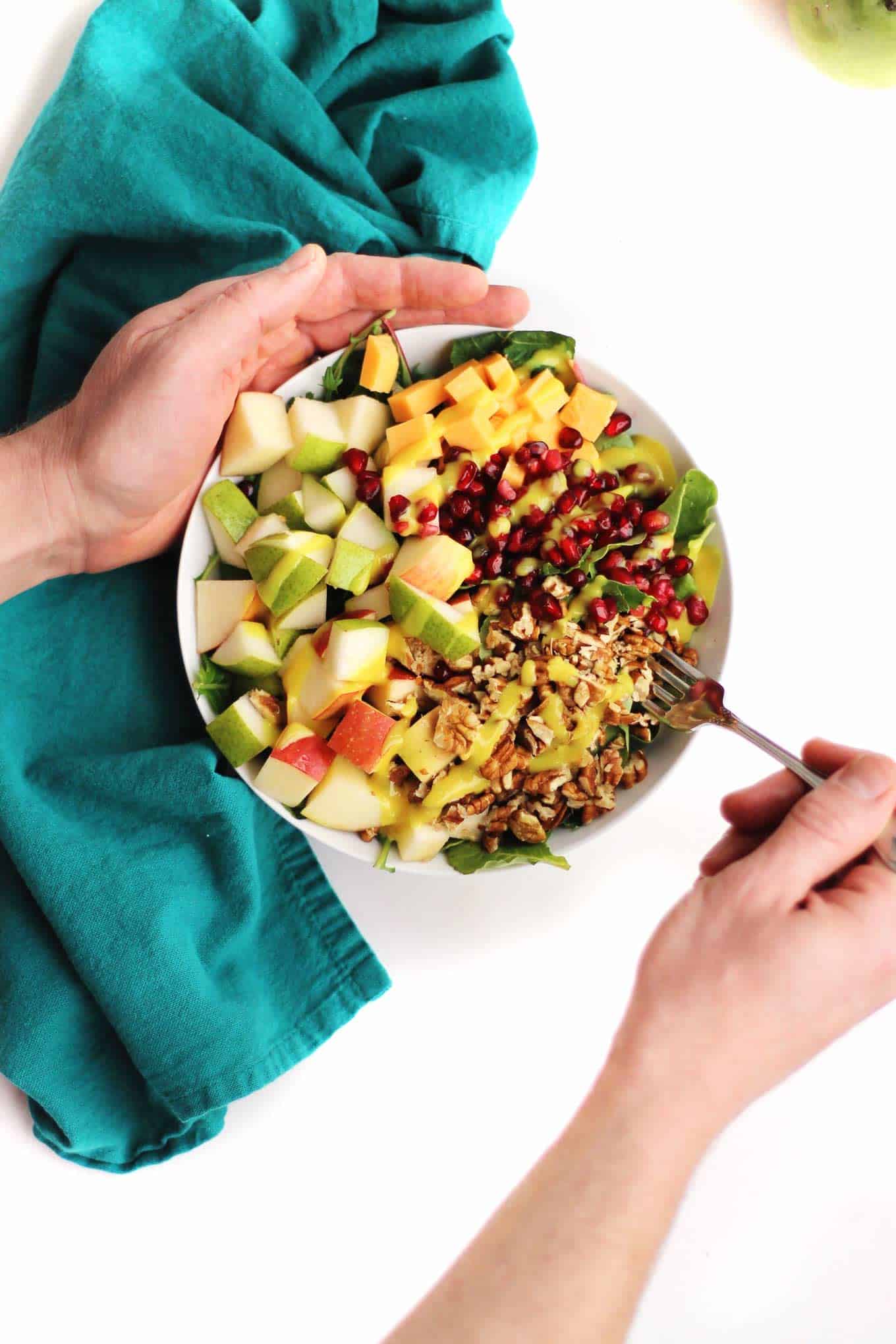 autumn spinach salad with hands