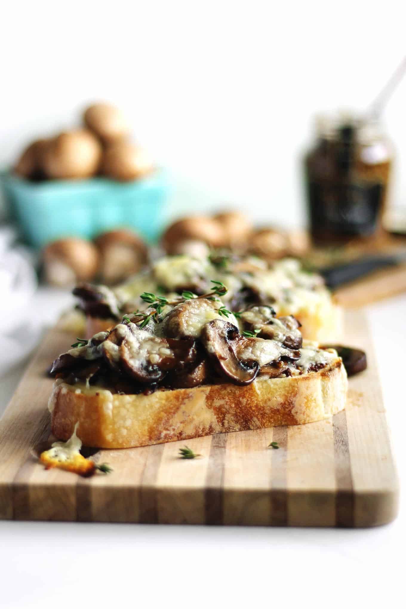mushrooms on toast with cheese and thyme