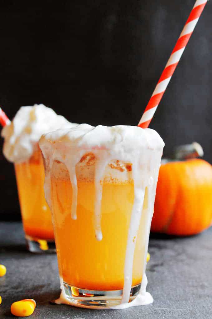 pumpkin soda with spilling whipped cream