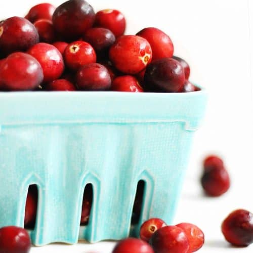 fresh cranberries in blue basket