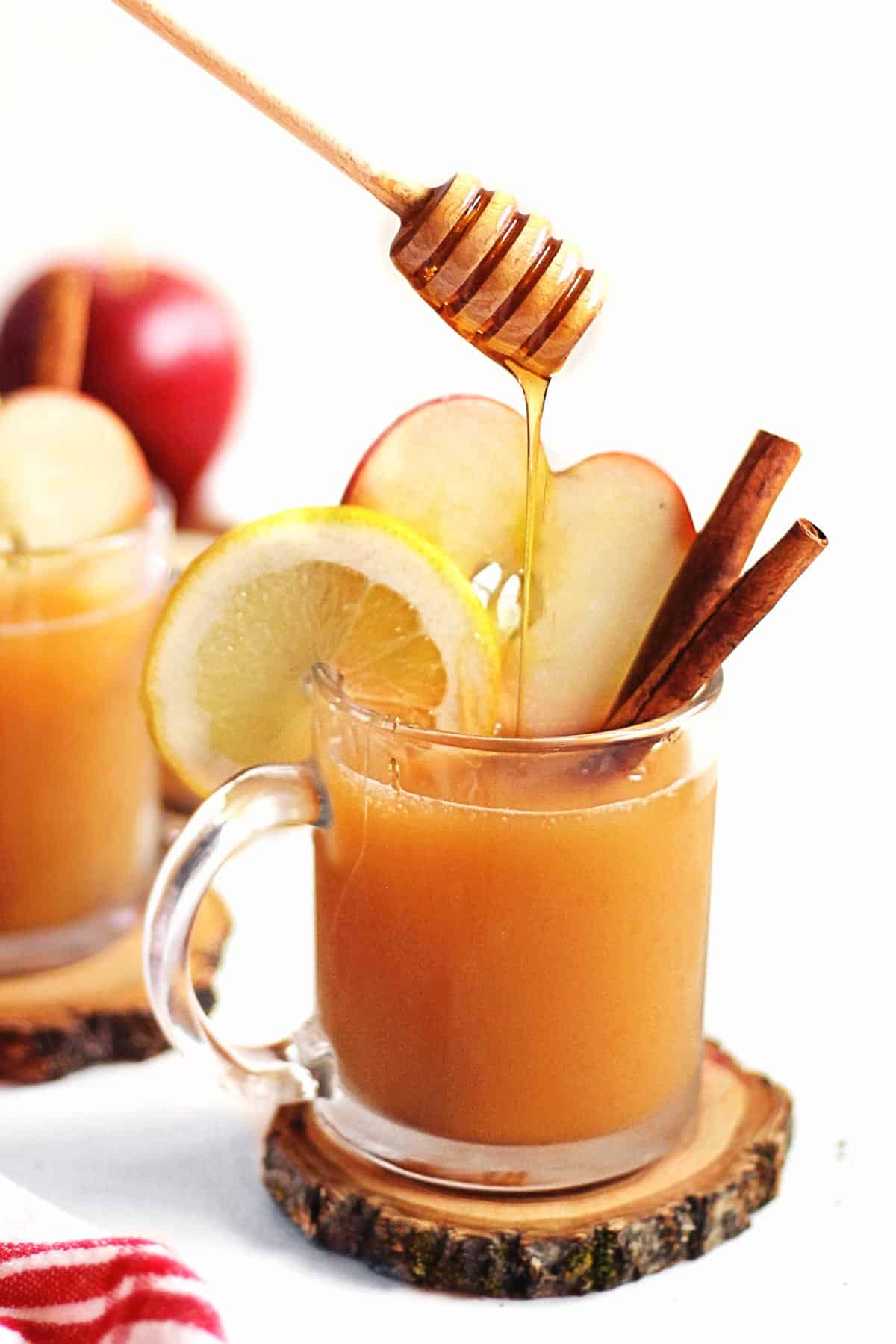 Apple cider hot toddy a warm and cozy whiskey cocktail Rhubarbarians