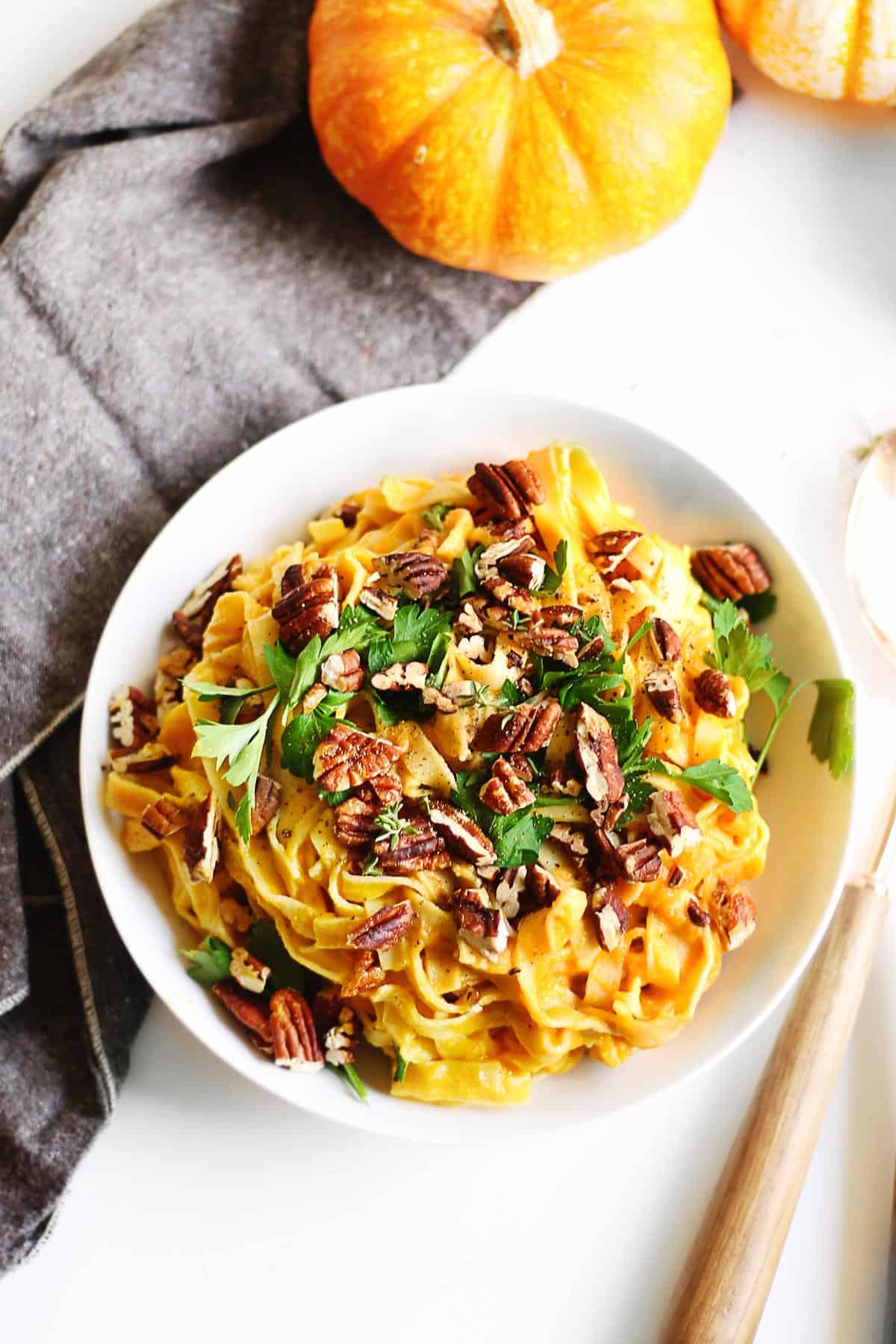 pumpkin fettuccine alfredo with pecans and parsley