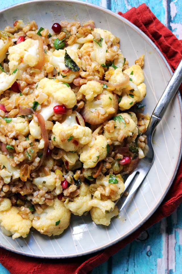 Roasted cauliflower and farro salad with a fork
