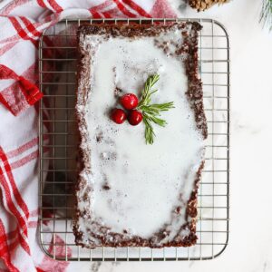 Gingerbread with fresh ginger and holly decoration