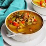 Vegan black eyed pea soup with a spoon