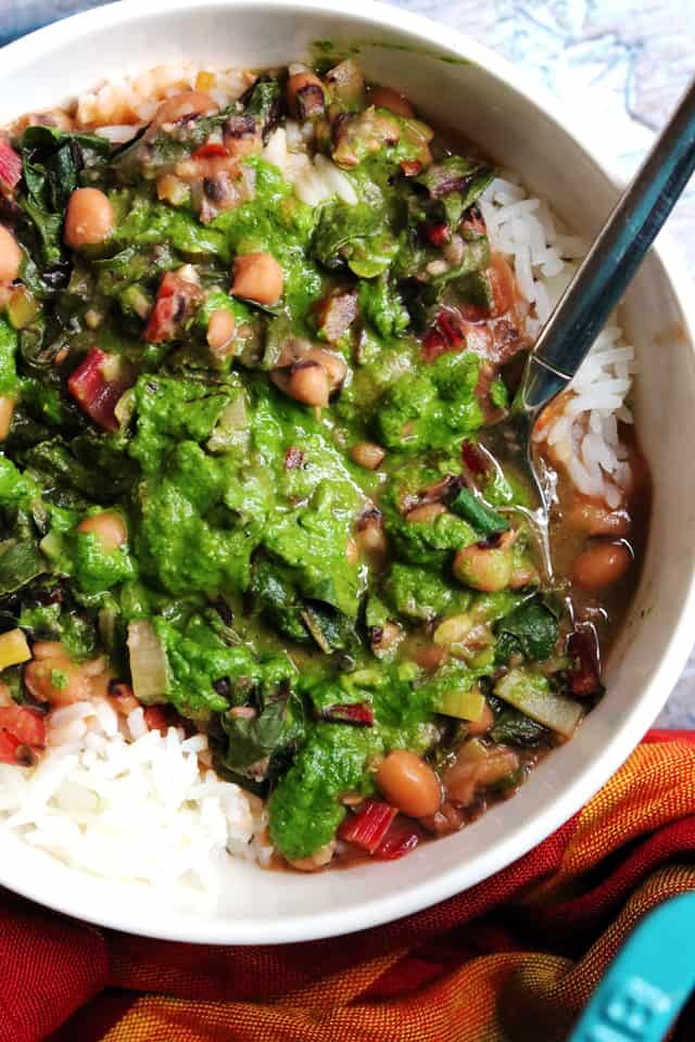 Black eyed pea stew with green herb smash