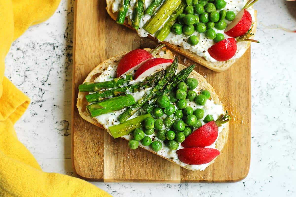 Asparagus, peas, and radish on toast