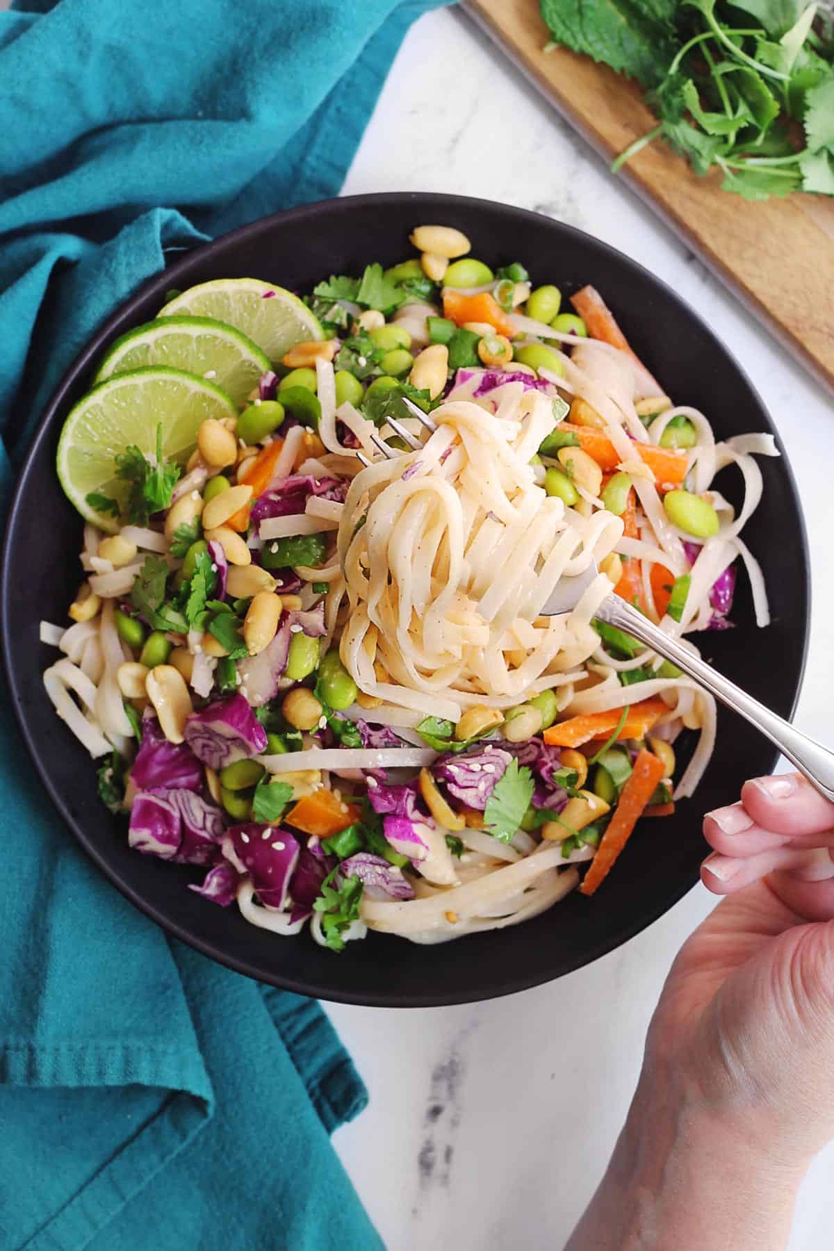 Thai peanut noodles on a fork