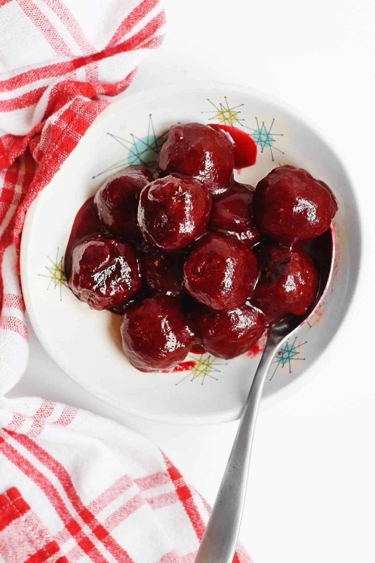 Vegan cranberry meatballs in a white bowl