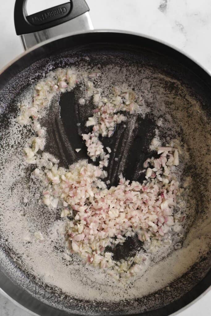 Cooking shallots and butter in a skillet