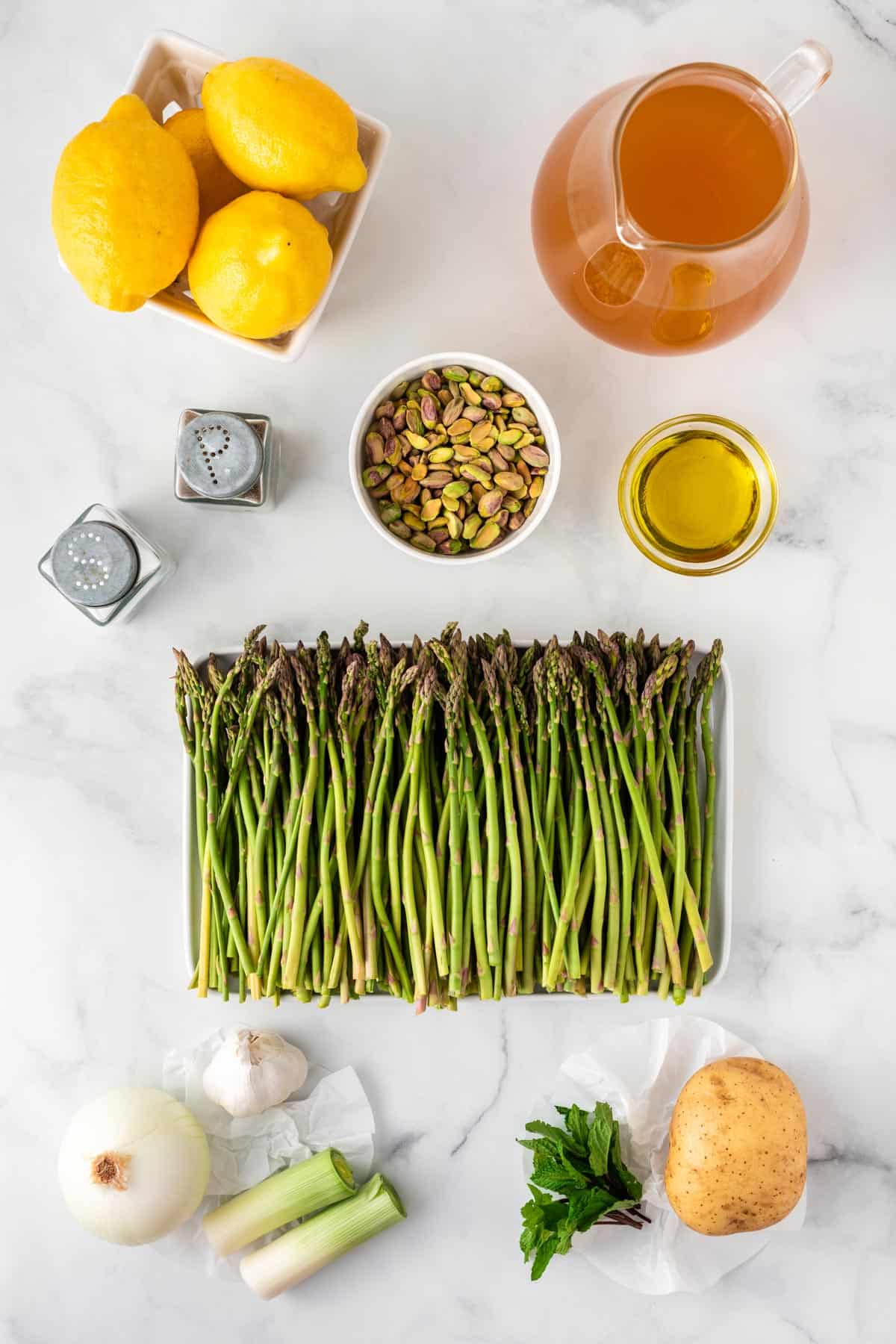 A picture of the ingredients needed to make vegan asparagus soup