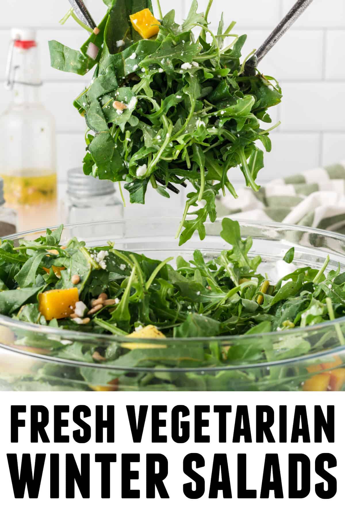 A photo of a scoop of arugula salad with text on the bottom that says, "fresh vegetarian winter salads."